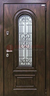 Темная филенчатая железная дверь со стеклом и ковкой ДСК-102 в Твери