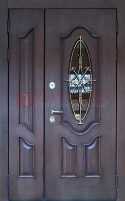 Темная металлическая дверь Винорит со стеклом и ковкой ДСК-239 в Твери