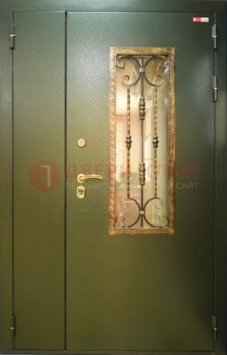 Стальная дверь со стеклом и ковкой ДСК-29 для квартиры в Костроме